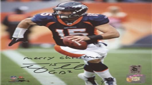 Tim Tebow Autographed Denver Broncos (Blue Jersey) with "Merry Christmas"