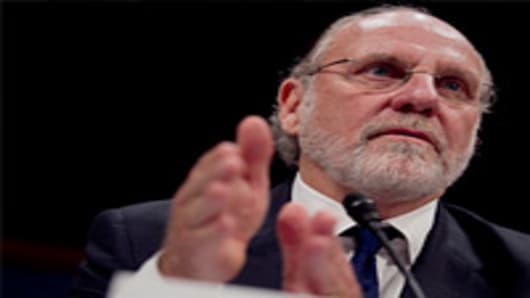 Jon S. Corzine, former chairman and chief executive officer of MF Global Holdings Ltd., testifies during a House Financial Services Committee.