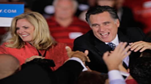 Mitt Romney and his wife Ann greet people during his Florida primary night party January 31, 2012 in Tampa, Florida.