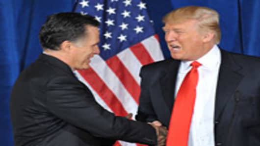 Businessman Donald Trump shakes hands with Republican presidential hopeful Mitt Romney after announcing his endorsement of Romney at Trump International Hotel & Tower on February 2, 2012 in Las Vegas.