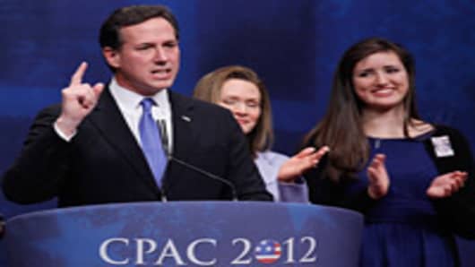 Republican presidential candidate Rick Santorum is joined on stage by his family as he delivers remarks to the Conservative Political Action Conference (CPAC) at the Marriott Wardman Park February 10, 2012 in Washington, DC