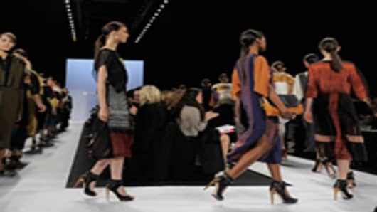 Models walk the runway at the BCBG Max Azria Fall 2012 fashion show during Mercedes-Benz Fashion Week.