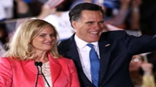 Mitt Romney and his wife Ann Romney thank supporters during a Super Tuesday event in Boston, Massachusetts.