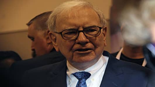 Warren Buffett visits the exhibition hall before answering shareholders' questions at Berkshire annual meeting.