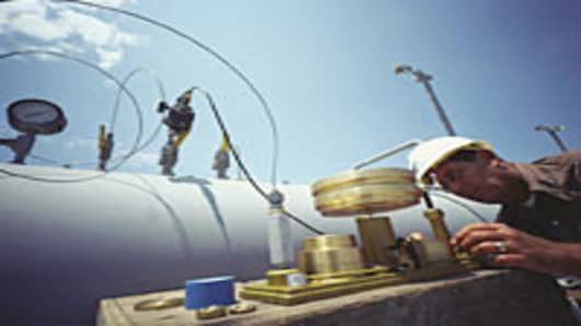 Engineer testing natural gas pipeline.