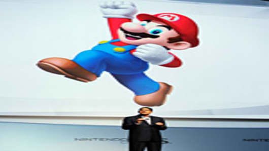 Reggie Fils-Aime, President, Ninyendo America, speaks during a news conference after the unveiling of the new game console Wii U at the Electronic Entertainment Expo on June 7, 2011 in Los Angeles, California.