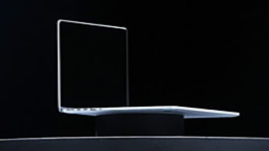 The new MacBook Pro is shown during the keynote address at the Apple 2012 World Wide Developers Conference.