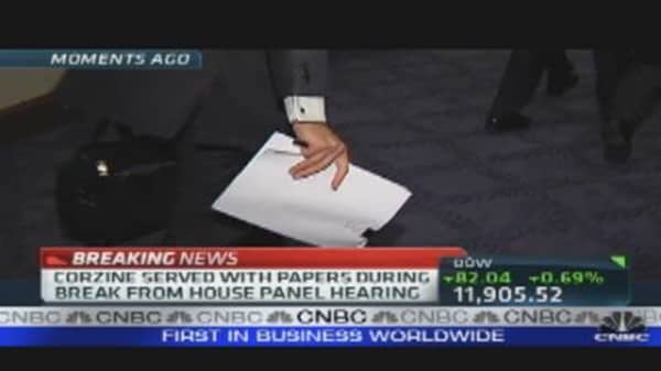 Corzine Served with Papers