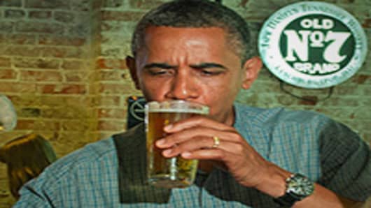 President Barack Obama drinks a beer at Ziggy's Pub and Restaurant in Amherts, Ohio.