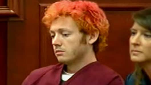 James Holmes, makes first appearance in court.