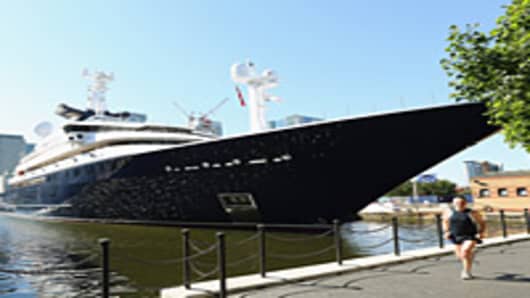 The 414ft luxury yacht 'Octopus' owned by Microsoft co-founder, Paul Allen, is moored in South Quay on the Isle of Dogs on July 23, 2012 in London, England.