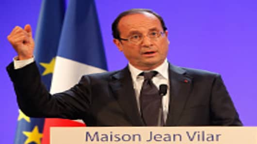 French President Francois Hollande speaks during a press conference at Maison Jean Vilar (Jean Vilar's House) while visiting the 66th Avignon Theatre Festival on July 15, 2012 in Avignon, southern France.