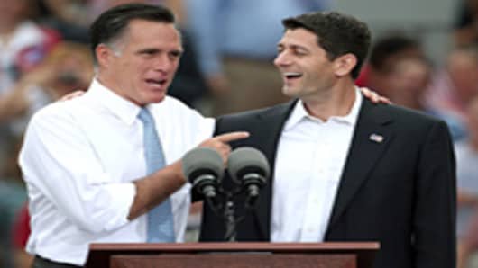 Republican presidential candidate, former Massachusetts Gov. Mitt Romney (L) jokes with U.S. Rep. Paul Ryan (R-WI) (R) after announcing him as the 'next PRESIDENT of the United States' during an event announcing him as his vice presidential running mate.