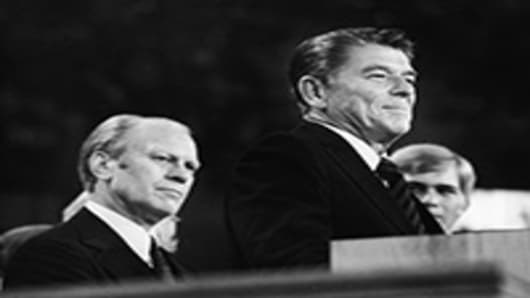 American president Gerald Ford (left) listens as future American president Ronald Reagan delivers a speech during the closing session of the Republican National Convention, Kansas City, Missouri.