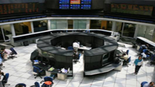 People work on the floor of the Mexican Stock Exchange, or Bolsa Mexicana de Valores (BMV), in Mexico City.
