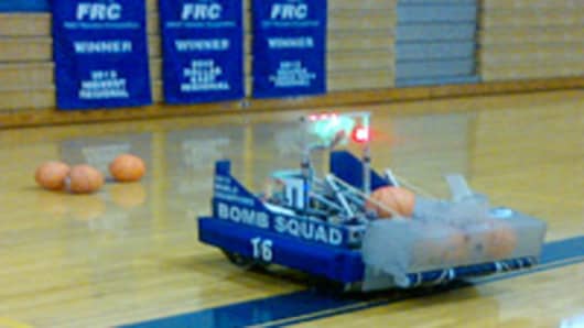 Basketball playing robot built by students.