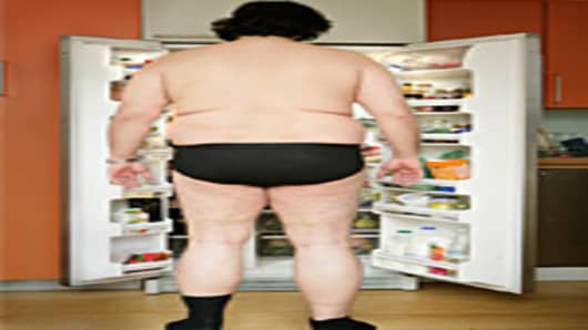 Fat man at fridge
