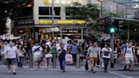 Shoppers in Singapore's main shopping district Orchard Road