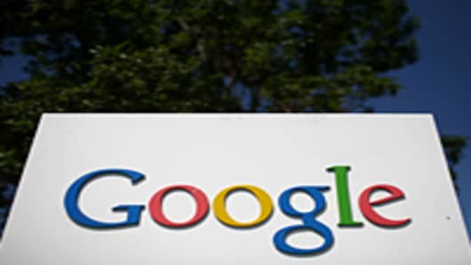 A sign is displayed outside of the Google headquarters in Mountain View, California.