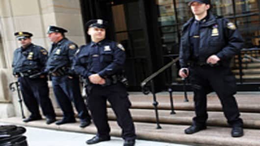 Police stand in front of the Federal Reserve Bank on October 17, 2012 in New York City. A Bangladeshi national was arrested Wednesday by Federal Authorities for allegedly plotting to blow up the Federal Reserve Bank in New York City.