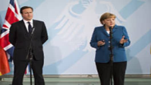 Merkel to Warn UK on Europe Budget Veto