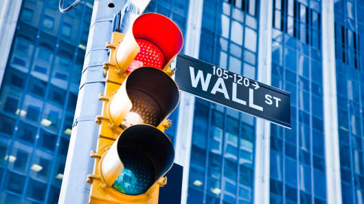 Wall Street sign and streetlight
