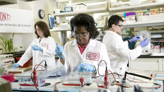 DuPont research scientists at work in a biobutanol molecular biology lab.