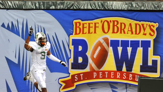 Wide receiver Aaron Dobson #3 of the Marshall Thundering runs 39 yards with a pass in the fourth quarter for a touchdown against the Florida International University Panthers December 20, 2011 in the Beef 'O' Brady's St. Petersburg Bowl in St. Petersburg, Florida.