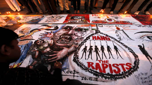 A poster at a protest against the gang rape of a 23-year-old in New Delhi, India