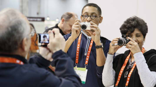 Attendees visit exhibitors in the PMA @ CES TechZone at the 2012 International CES.