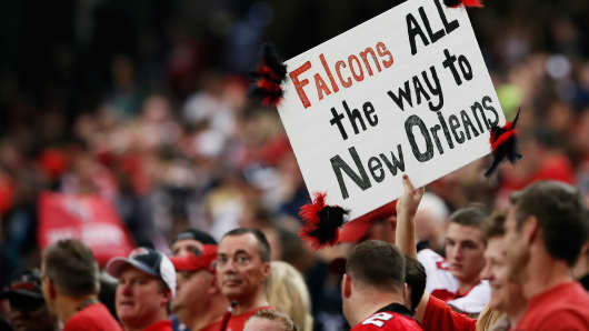An Atlanta Falcons fan holds up a sign during the NFC Divisional Playoff Game against the Seattle Seahawks at Georgia Dome on January 13, 2013 in Atlanta, Georgia.