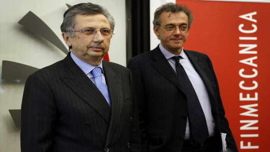 Giuseppe Orsi, chief executive officer of Finmeccanica SpA, left, and general manager Alessandro Pansa