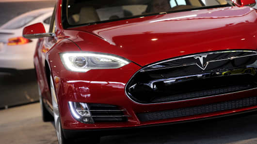 A Tesla Motors Inc. vehicle is displayed during the 2013 North American International Auto Show (NAIAS) in Detroit, Michigan, U.S.