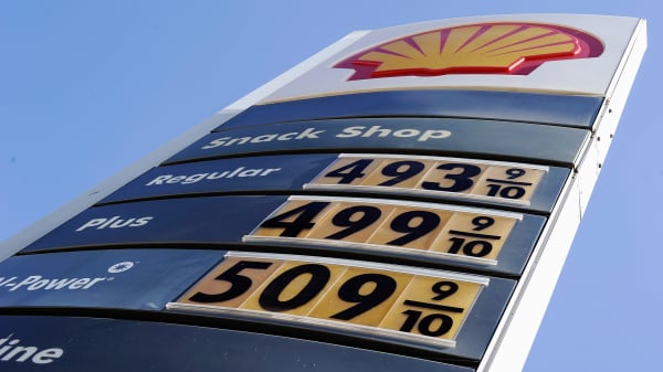 Gas prices over four and five dollars are posted on a Shell station on Olympic Boulevard in Los Angeles, California.
