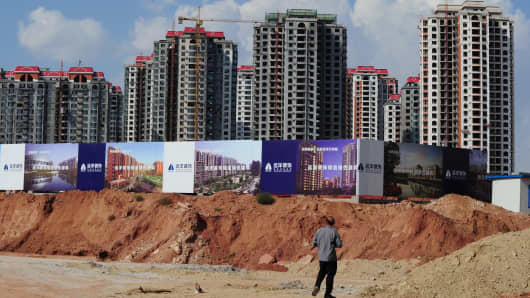 Empty apartment developments stand in the city of Ordos, Inner Mongolia.