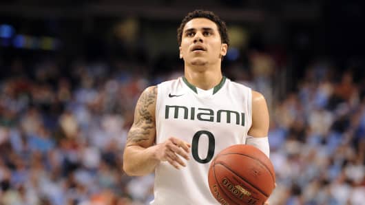 Shane Larkin #0 of the Miami Hurricanes concentrates at the free throw line
