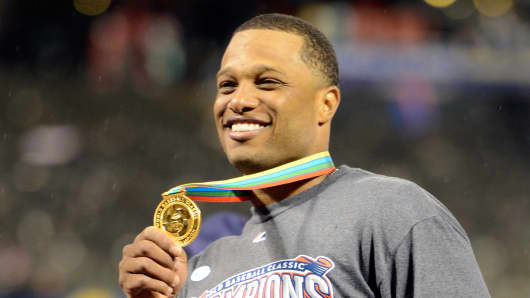 Robinson Cano #24 of the Dominican Republic celerbates after defeating Puerto Rico to win the Championship Round of the 2013 World Baseball Classic