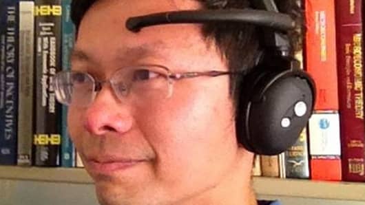 Professor John Chuang with the Neurosky MindSet brainwave sensor.