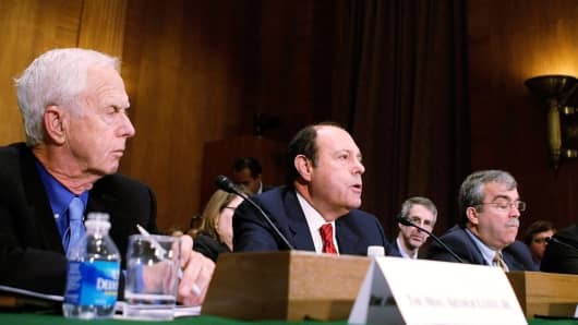 Eugene A. Ludwig, center, founded Promontory Financial after serving as President Bill Clinton’s comptroller of the currency.
