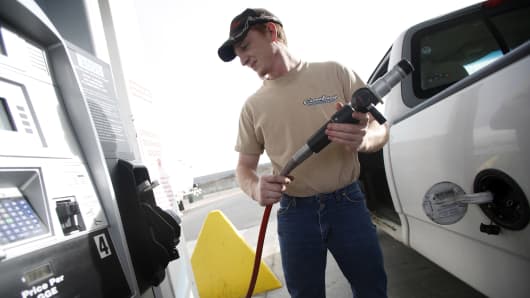 A man fills his truck with CNG at a Blu LNG filling station in Salt Lake City, Utah.