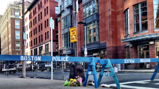 Flowers are placed near the bombing site in Boston.