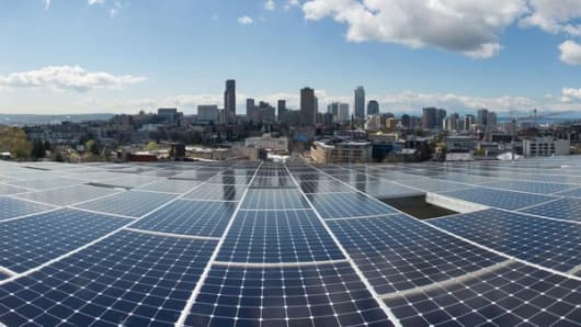 An array of 575 solar panels covers the roof of Seattle's Bullitt Center, a model for a new generation of sustainable, energy-efficient buildings.