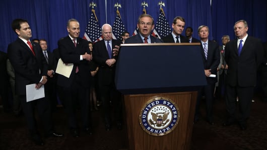 Senators, dubbed the "Gang of Eight," hold a news conference on immigration legislation.