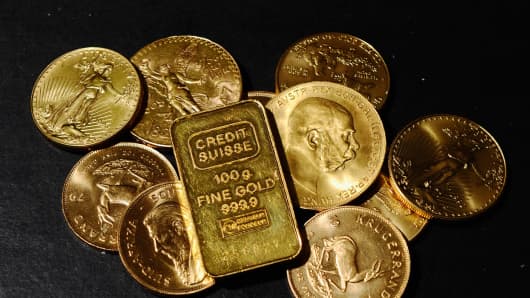 Gold Coins and Credit Suisse gold bar