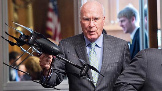 Sen. Patrick Leahy, D-Vt., holds a Draganflyer X6 drone at a Judiciary Committee hearing.