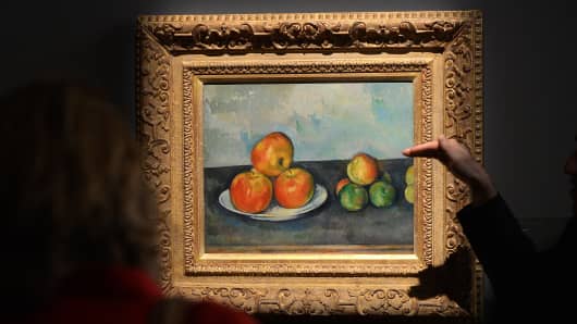 'Les Pommes' by Paul Cezanne on display during a preview