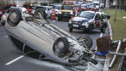 View of an overturned car in an accident on Ruben Berta Avenue on October 20, 2012 in Sao Paulo, Brazil.