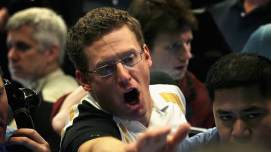 A trader signals an offer in the Standard & Poor's 500 stock index options pit at the Chicago Board Options Exchange.