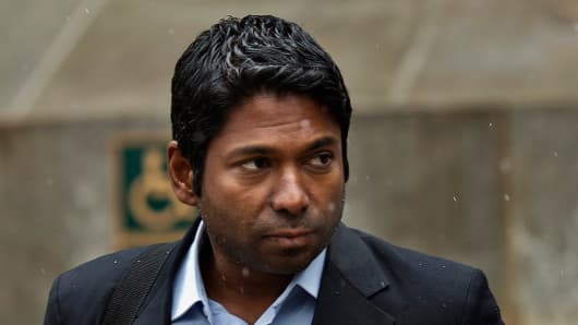 Rengan Rajaratnam, founder of Sedna Capital Management and the younger brother of imprisoned hedge fund founder Raj Rajaratnam, exits federal court in New York.