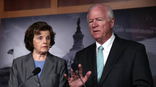 Chairman and vice chairman of the U.S. Senate Select Committee on Intelligence, Sen. Dianne Feinstein (D-Calif.), left, and Sen. Saxby Chambliss (R-Ga.) speak to members of the media. According to reports, the NSA has collected phone data, under a provision of the Patriot Act, of Verizon customers in the U.S.